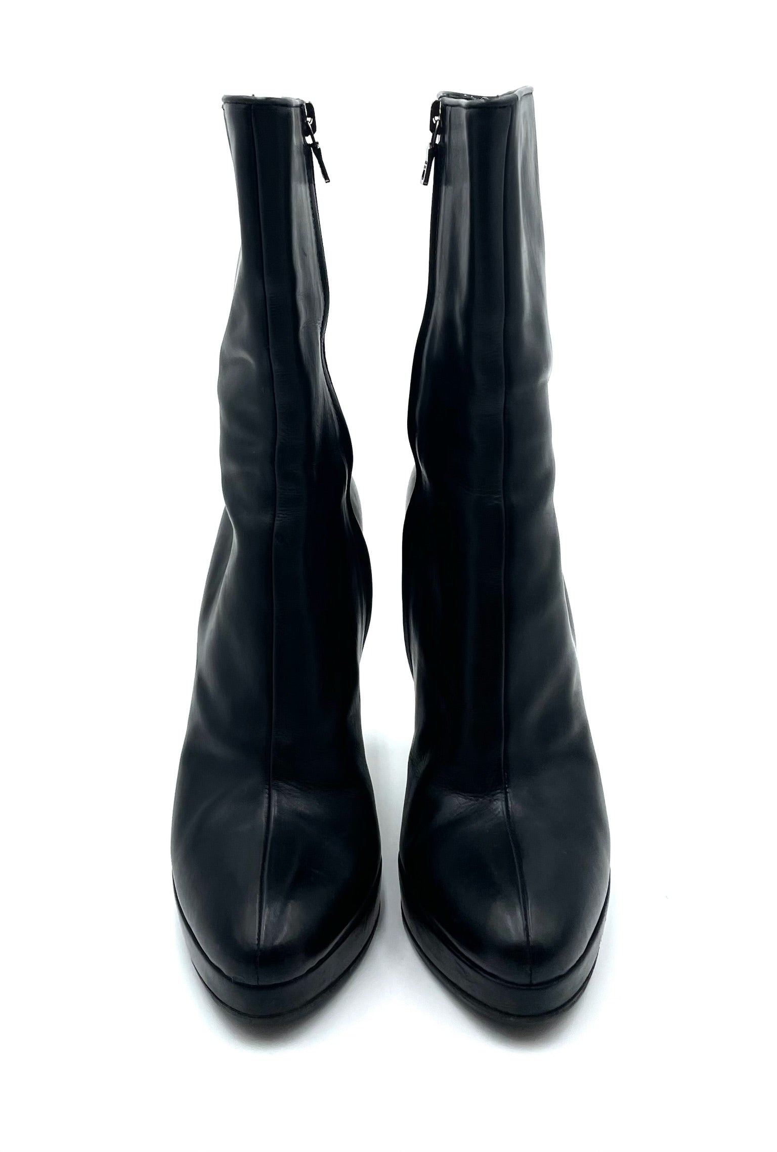 Prada black leather platform ankle boots with round toes and side zip closures, size 39.