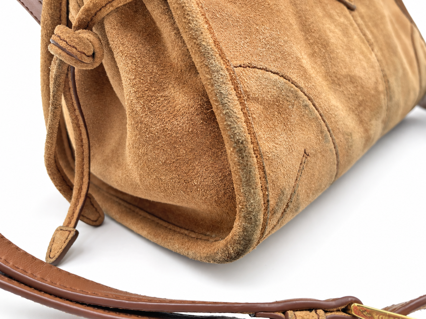 Prada cinnamon brown suede Bonnie shoulder bag with drawstring detail and gold hardware.