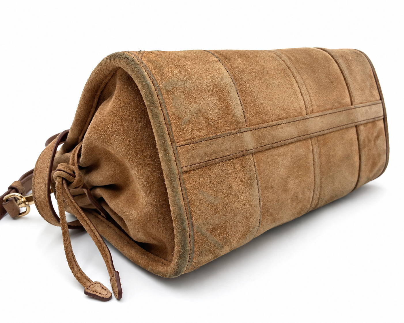 Prada cinnamon brown suede Bonnie small shoulder bag with gold hardware and drawstring side detail.