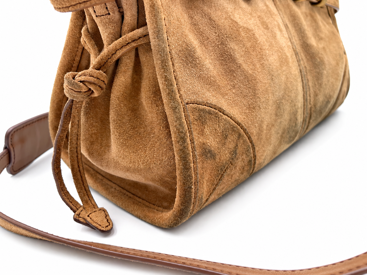 Prada Bonnie small cinnamon brown suede shoulder bag with drawstring side detail and leather strap.