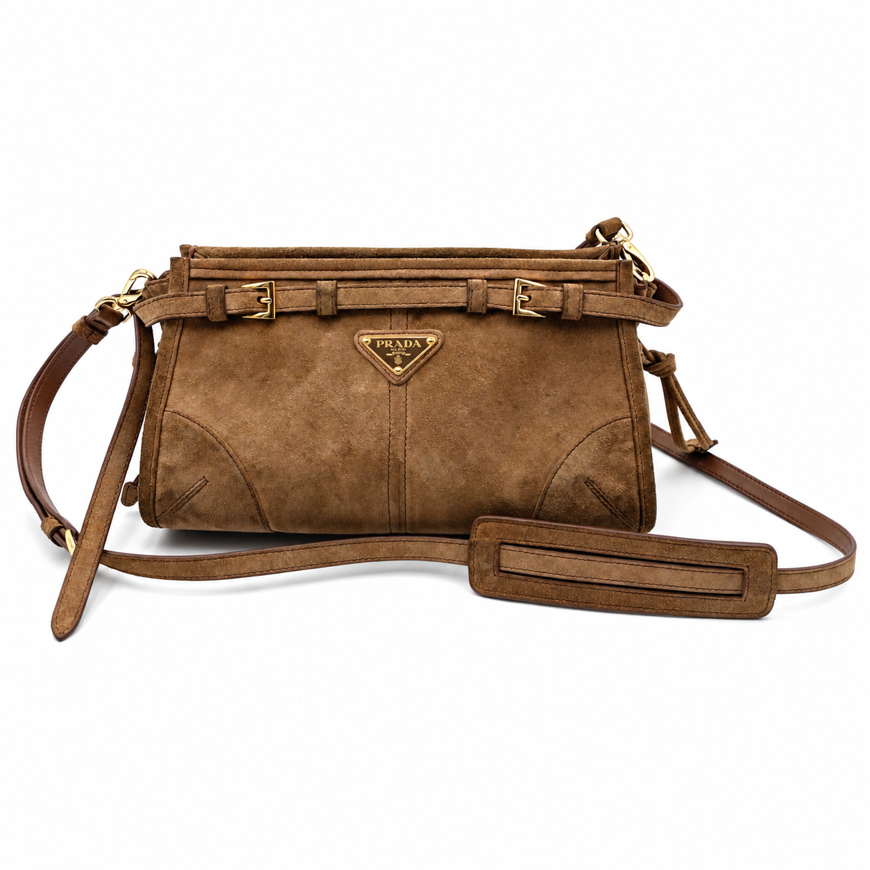 Prada Bonnie small cinnamon brown suede shoulder bag with gold hardware, buckle details, and a detachable crossbody strap.