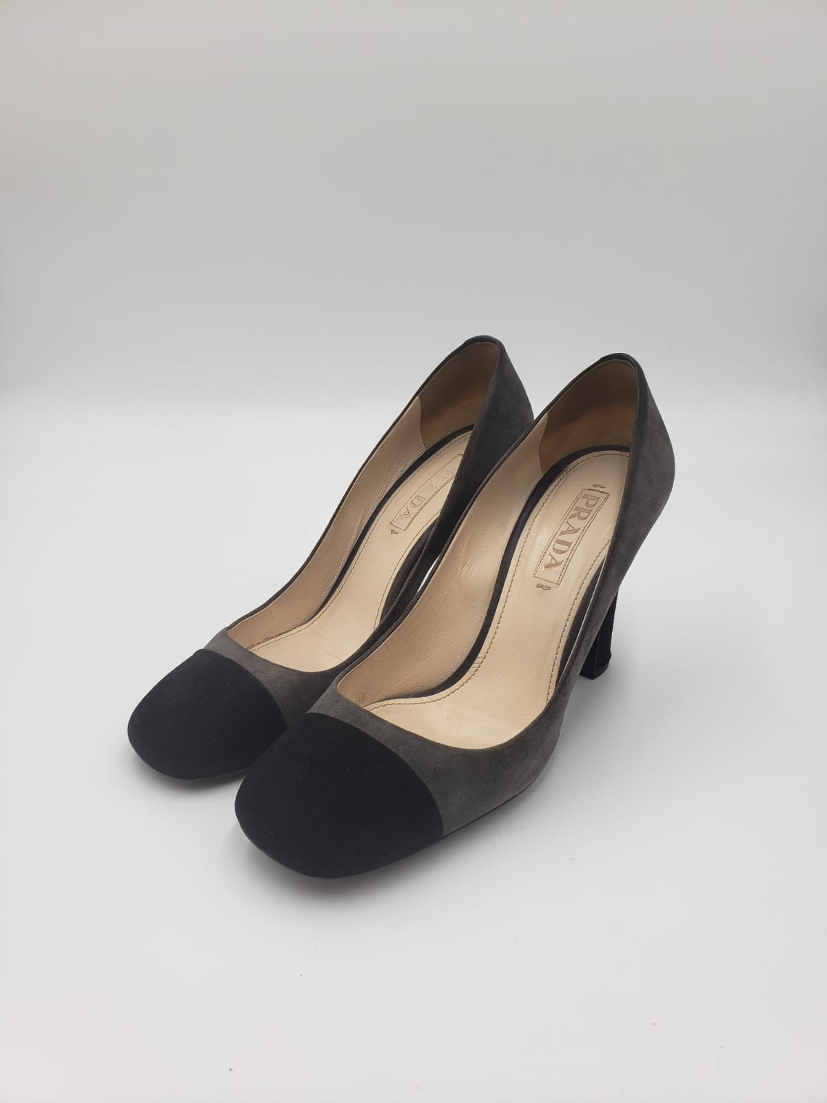 Prada grey and black captoe suede pump, size 38, with round toe and color block detail.