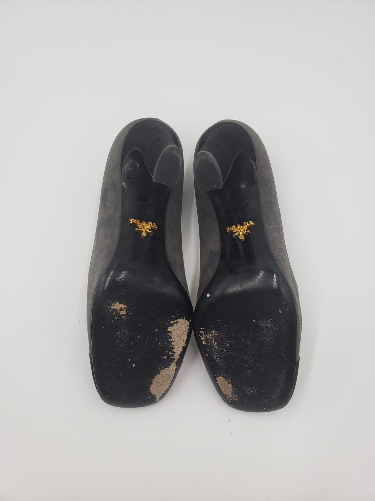 Prada Grey & Black Captoe Suede Pump, size 38, showing worn soles and gold logo.