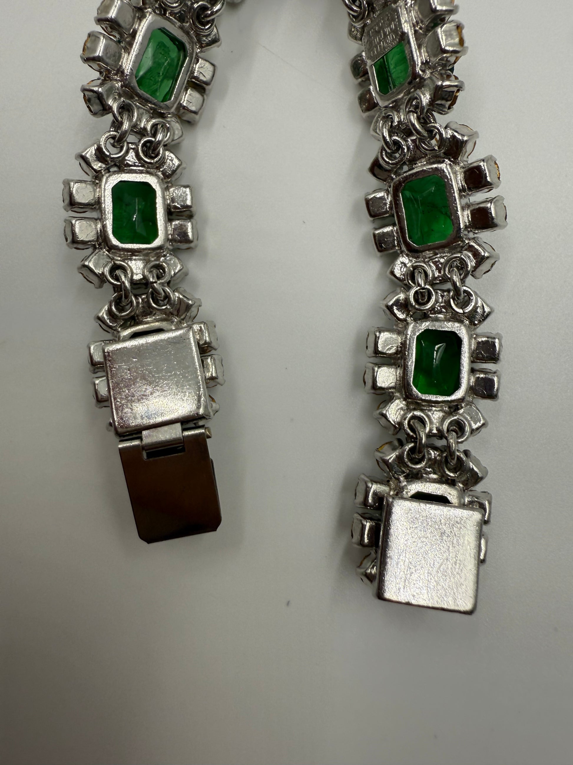 Rare 1972 Christian Dior silver-tone bracelet with emerald green glass stones and clear crystal rhinestones.