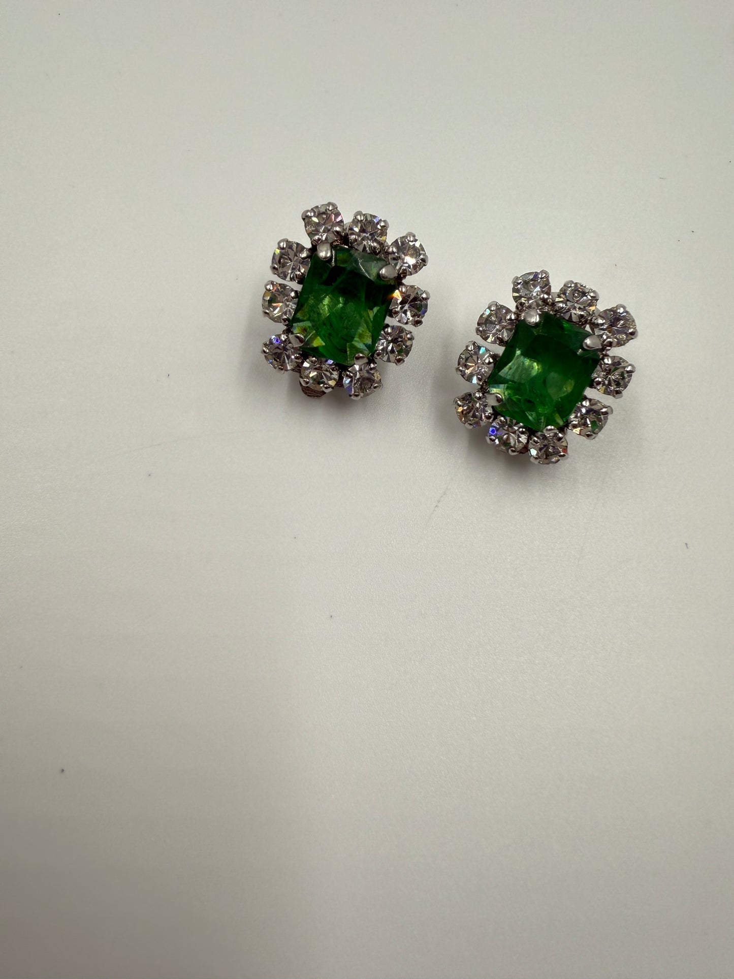 Rare 1973 Christian Dior emerald glass and clear crystal rhinestone clip earrings.