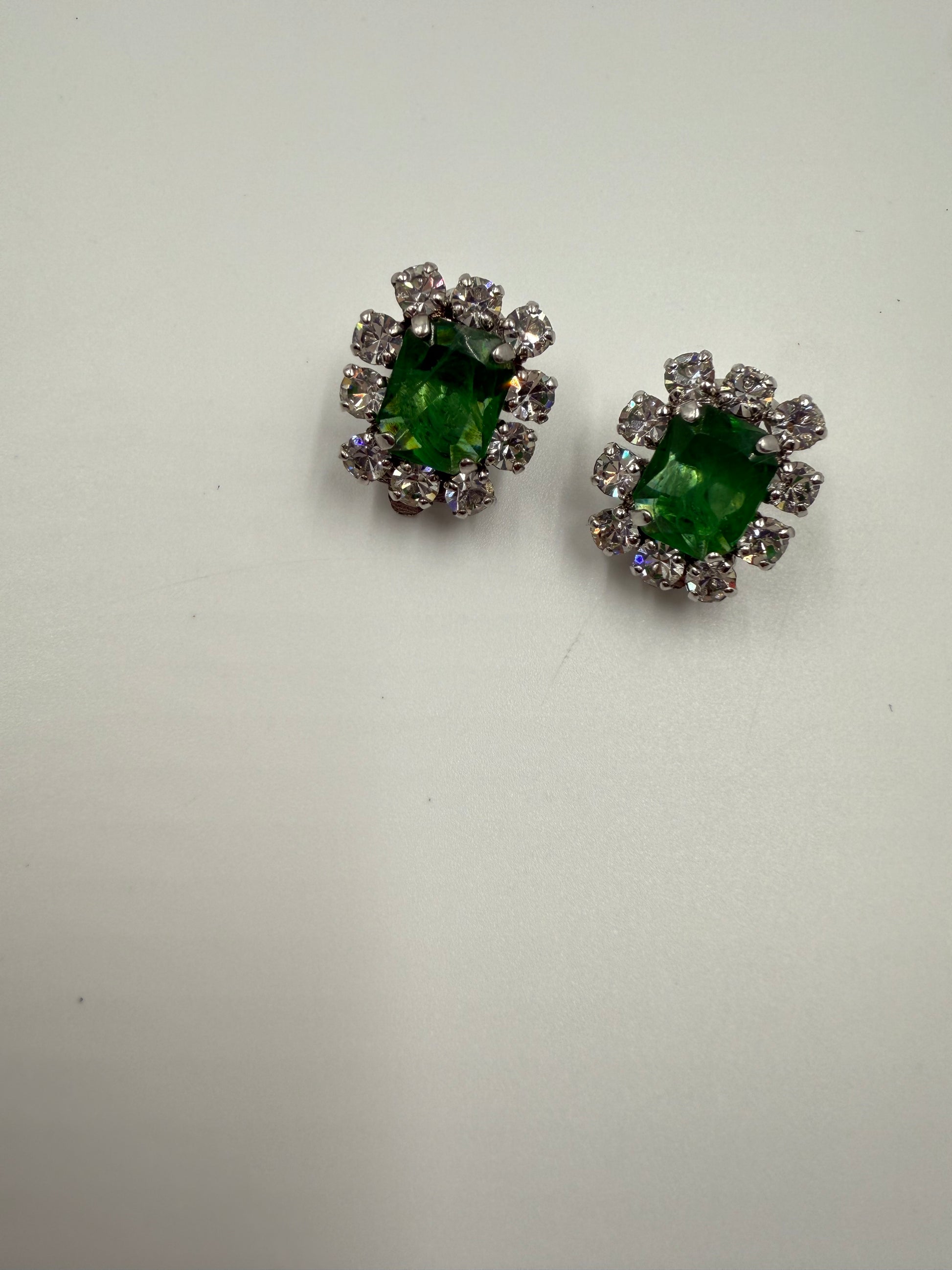 Rare 1973 Christian Dior emerald glass and clear crystal rhinestone clip earrings.
