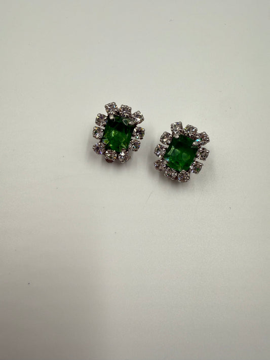Rare 1973 Christian Dior emerald glass cabochon clip earrings with clear crystal rhinestones.