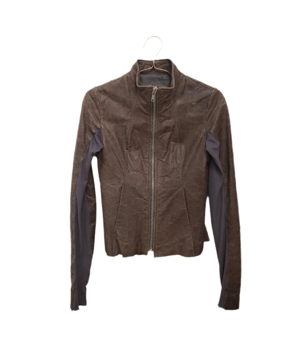 Rick Owens brown lambskin leather jacket, size 6US, with front zip closure and dark fabric sleeve panels.