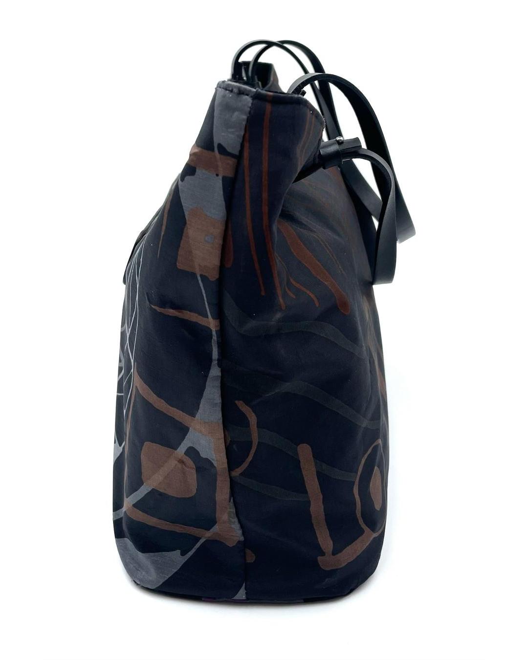 Salvatore Ferragamo nylon tote in black with brown and grey abstract print and black top handles.