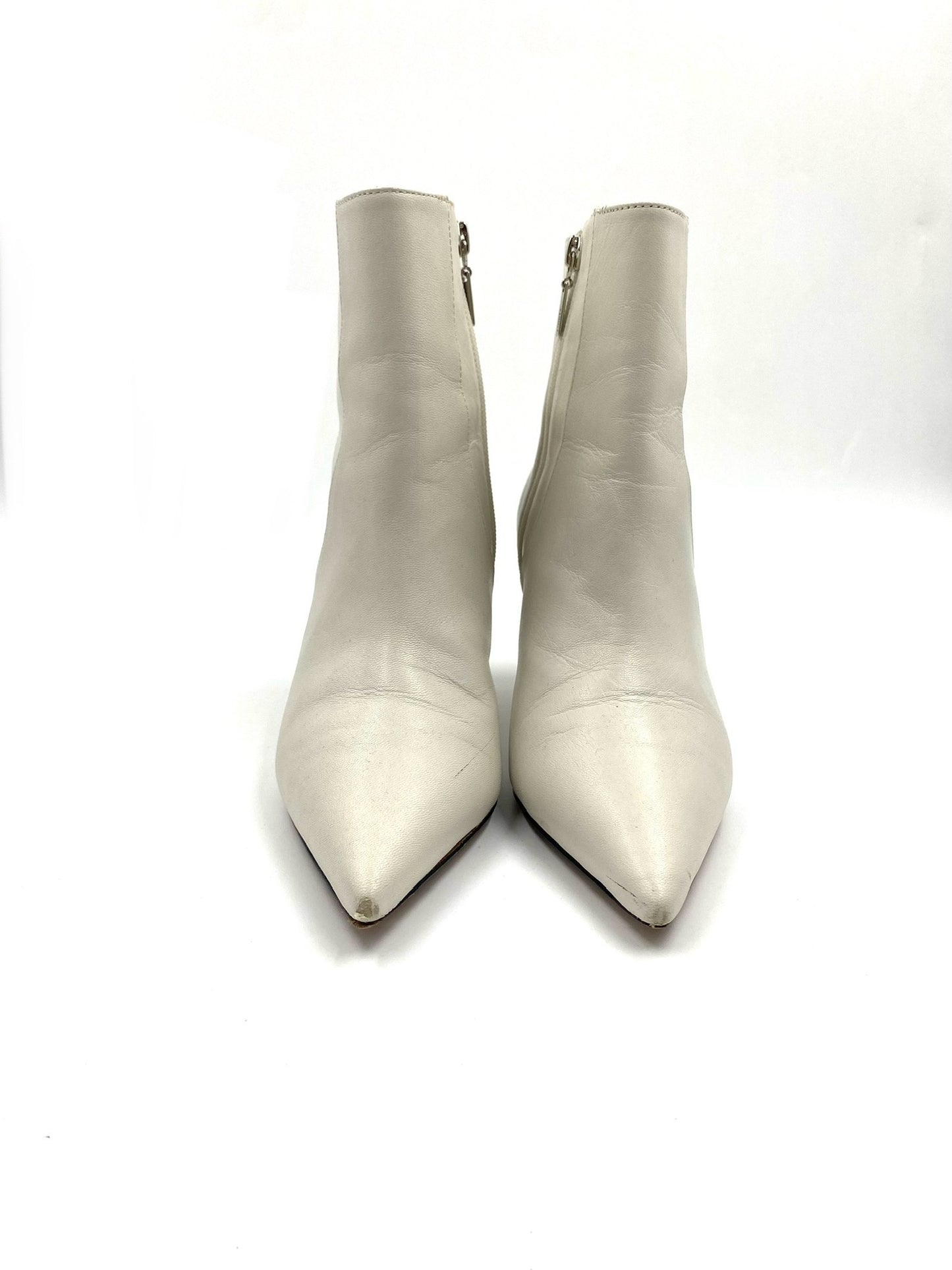 Schutz white leather pointed ankle boots, size 8B, with side zip closure.