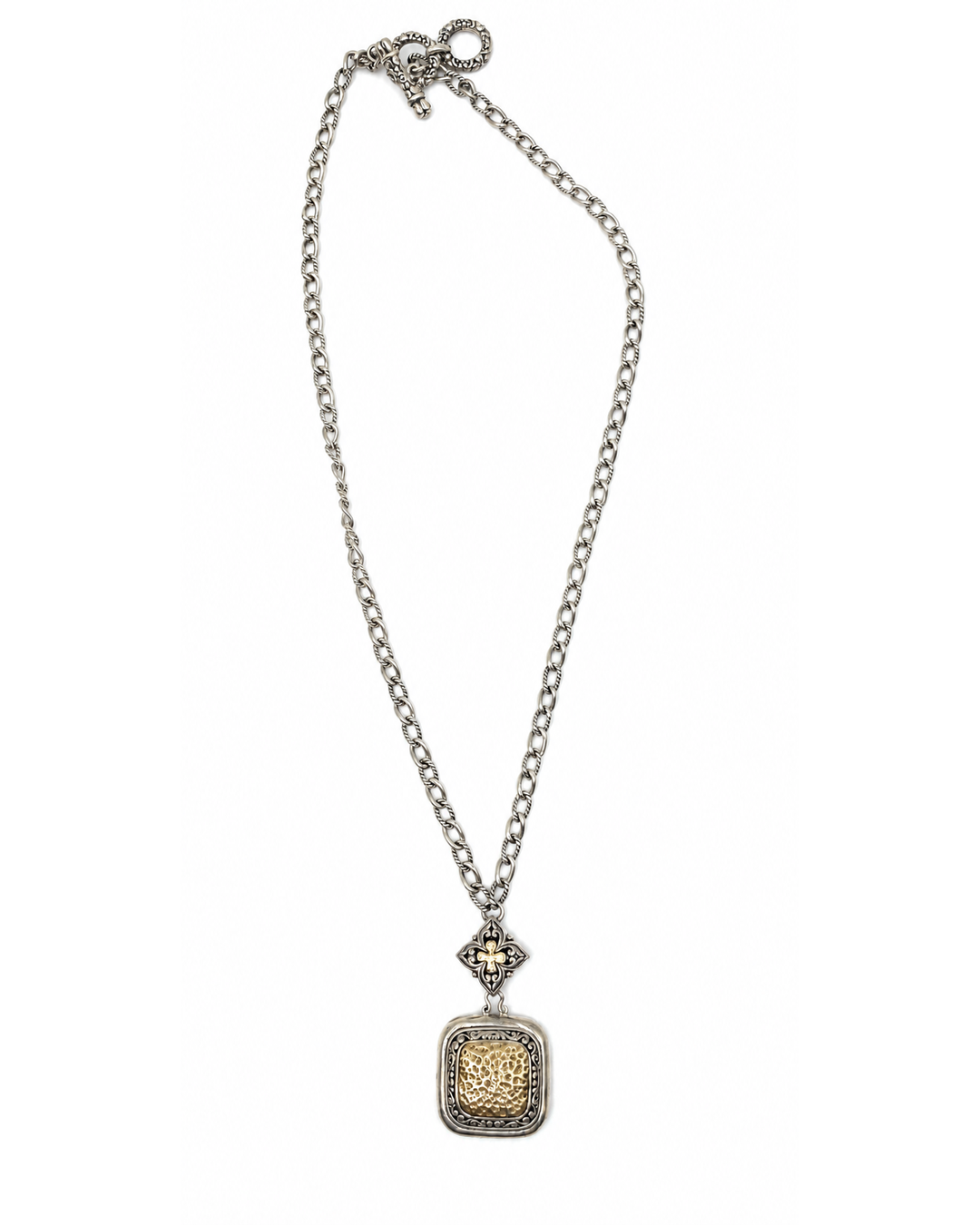 Two-tone sterling silver necklace with a hammered gold-tone square pendant, scrollwork, and a decorative floral connector.
