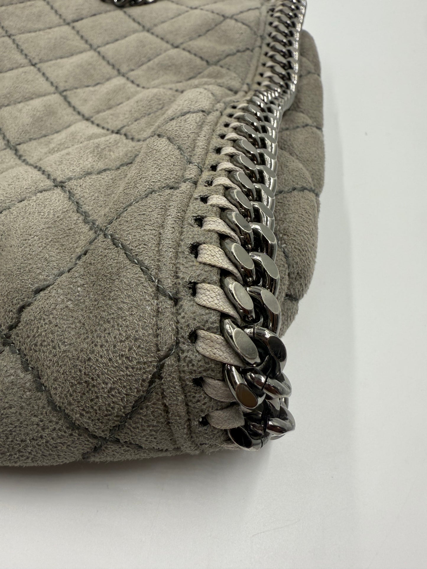 Stella McCartney Falabella grey quilted suede tote bag with silver chain strap.
