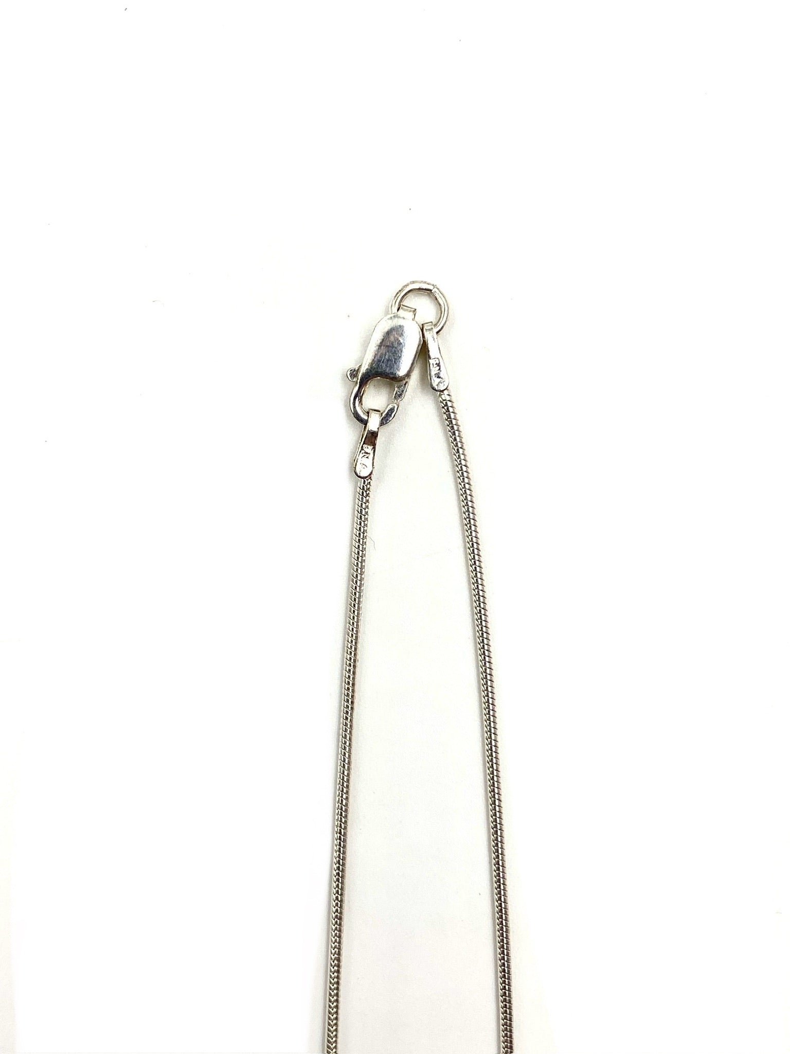 Sterling silver necklace with a lobster clasp closure.