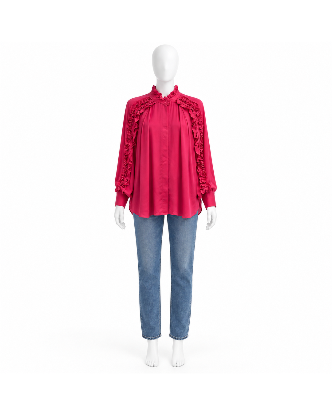 Ungaro fuchsia silk long-sleeve blouse with ruffle details on a mannequin wearing blue jeans.