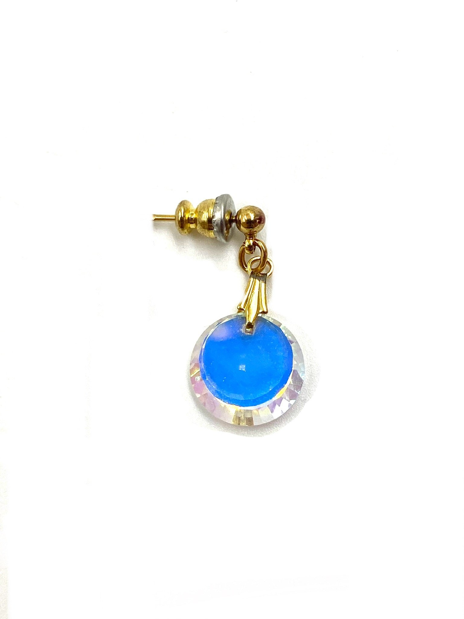 Vintage Austrian reflective crystal post earring with a gold-tone setting and iridescent blue center.