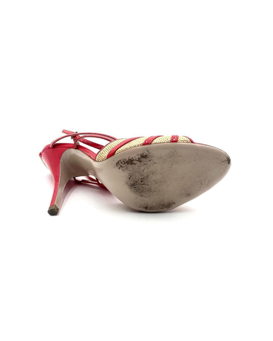 Salvatore Ferragamo orange strappy heels, size 8.5, featuring a textured beige panel and worn sole.
