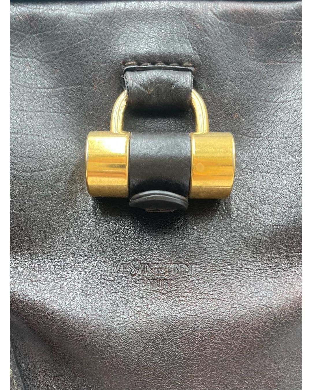 Dark brown leather Yves Saint Laurent Muse bag featuring gold-tone hardware and embossed logo detail.