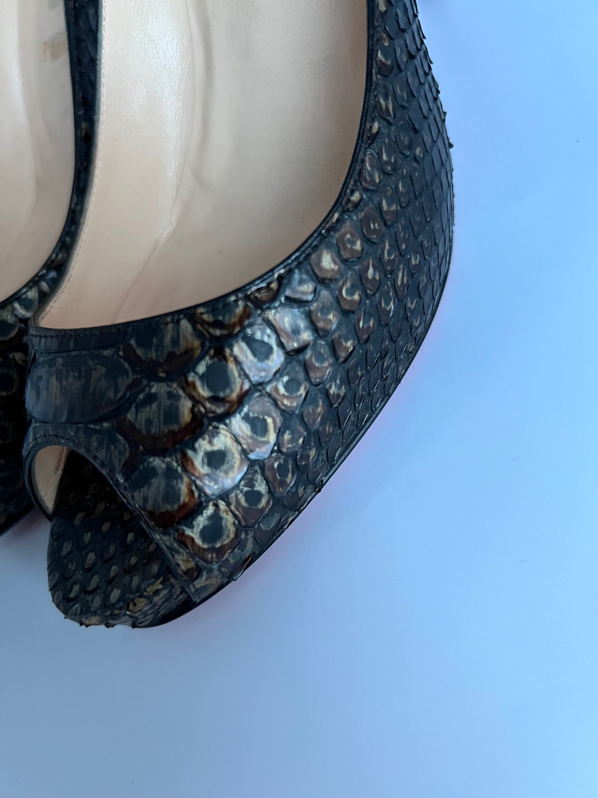 Louboutin snakeskin shoes hotsell