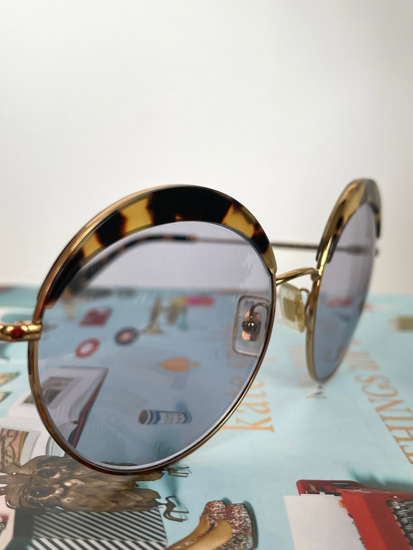 Miu Miu Round Lens Tortoise Sunglasses